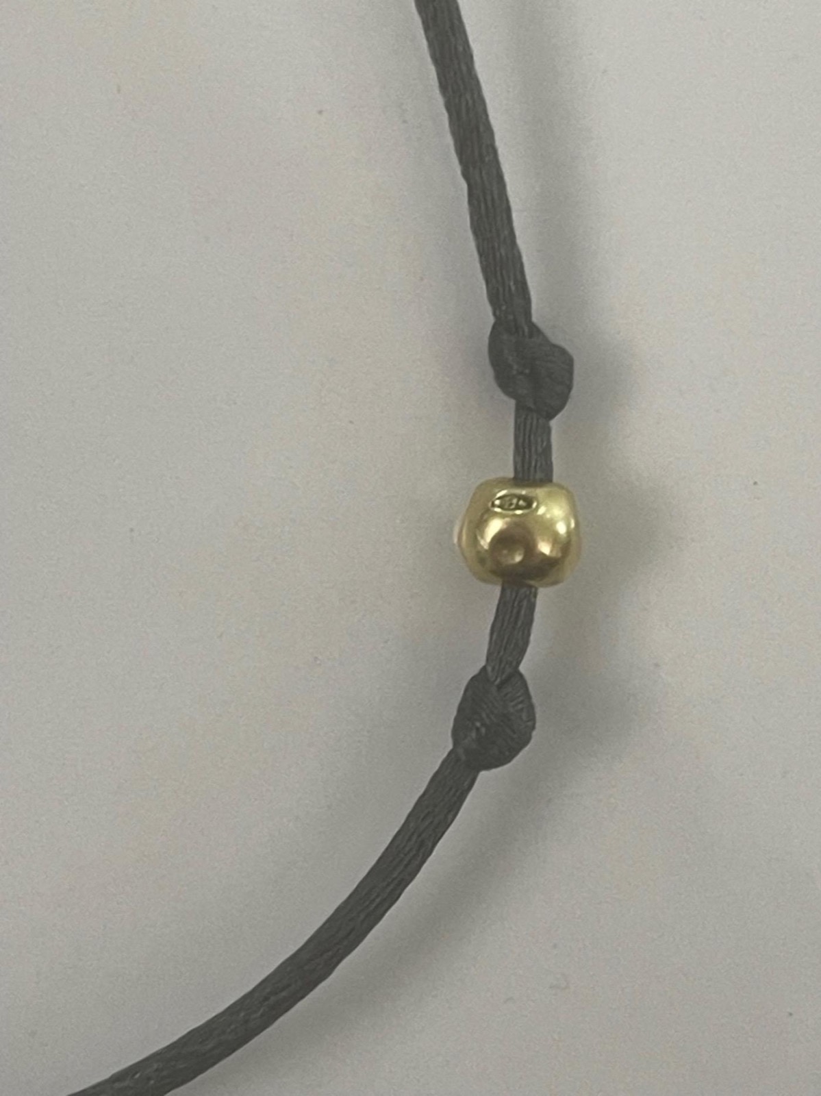 DO/Bracelet DoDo avec perle 