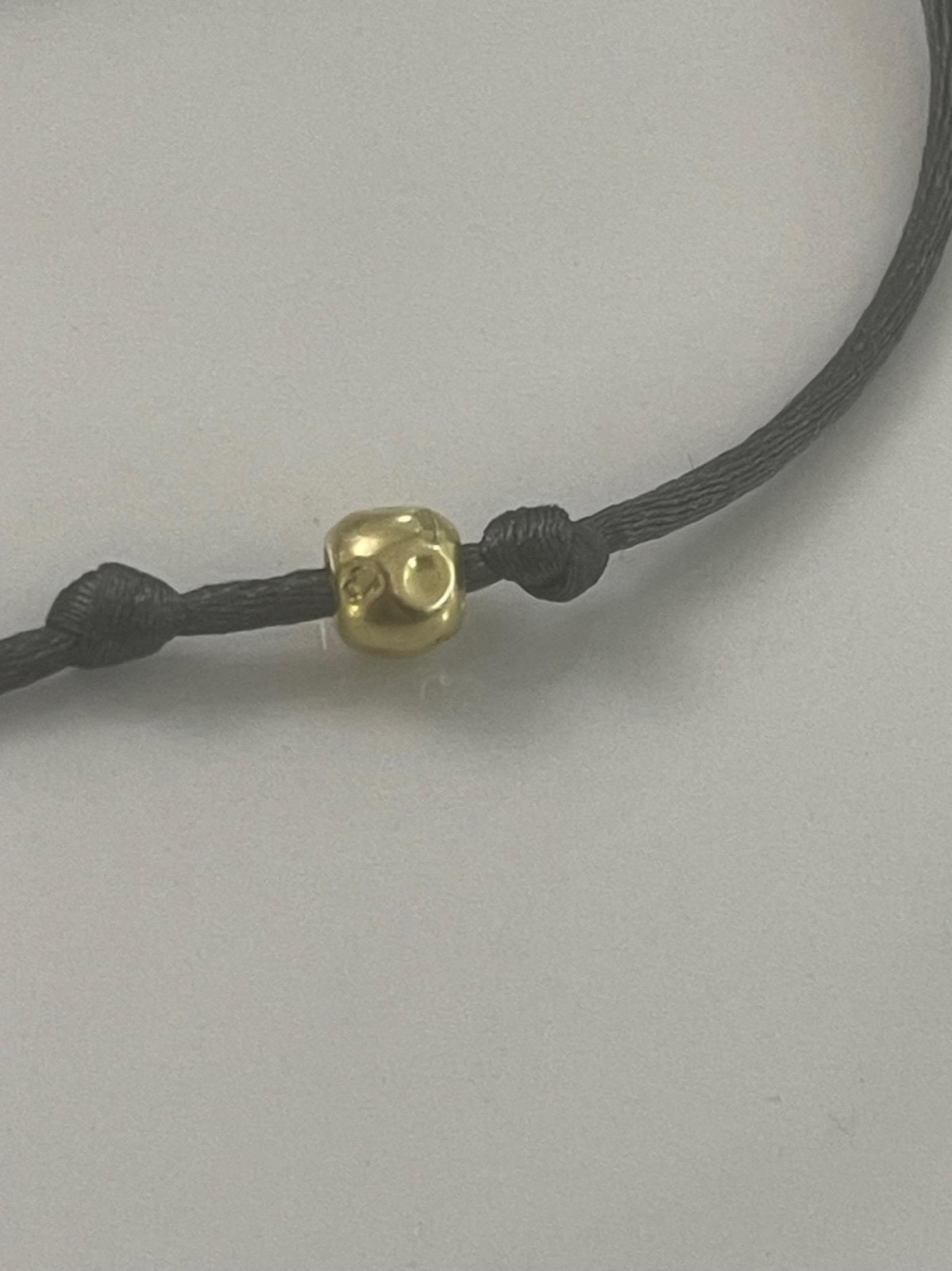 DO/Bracelet DoDo avec perle 